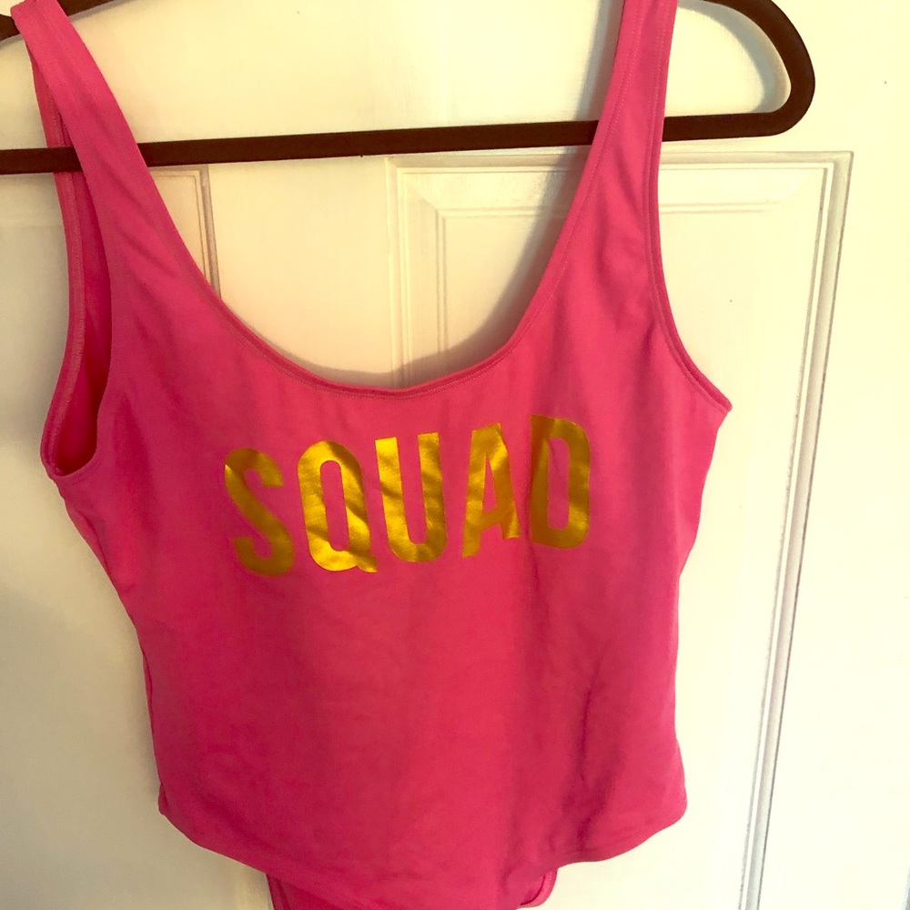 Bright pink Squad one piece suit
